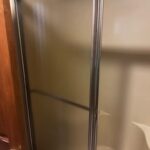 Sparkling clean glass shower door after cleaning by Taylor Cleaning LLC in Indianapolis